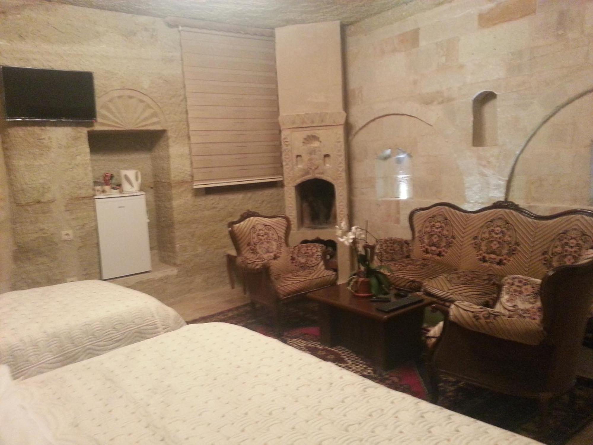 Family Cave Suite Hotel Гореме Номер фото